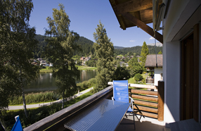 Ferienwohnung in Laax mit Ausblick auf den Laaxersee